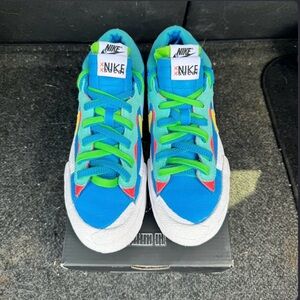 Nike Blazer Low / SACAI / KAWS
‘Neptune blue’